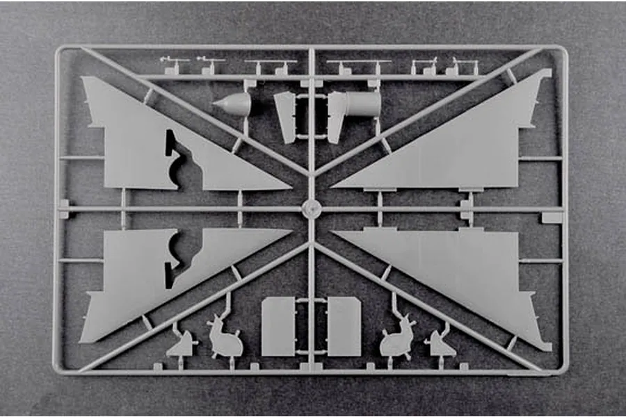 A grey plastic sprue from a Trumpeter 1/48 scale model kit containing aircraft wing and fuselage components.