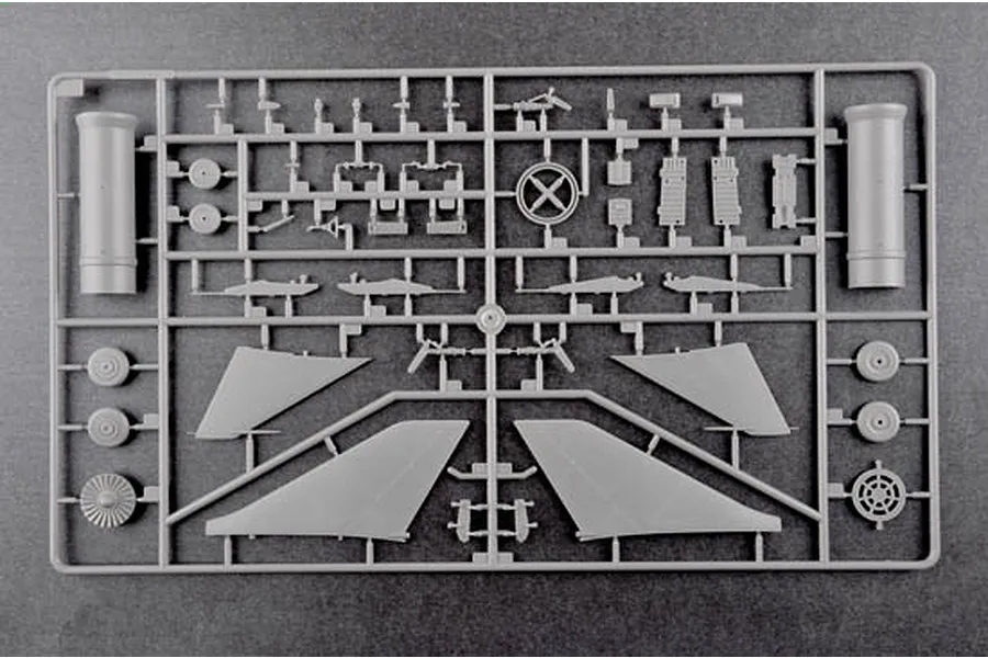 A grey plastic sprue from a Trumpeter 1/48 scale model kit containing various aircraft parts including wings, wheels, and engine components.