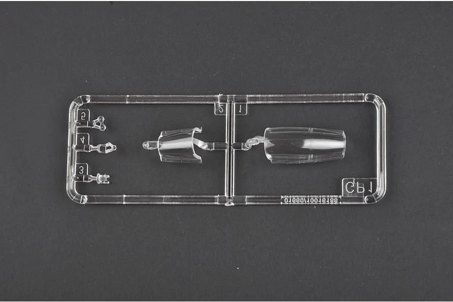 A clear plastic sprue containing the canopy and small cockpit parts for a 1/72 scale model aircraft kit.