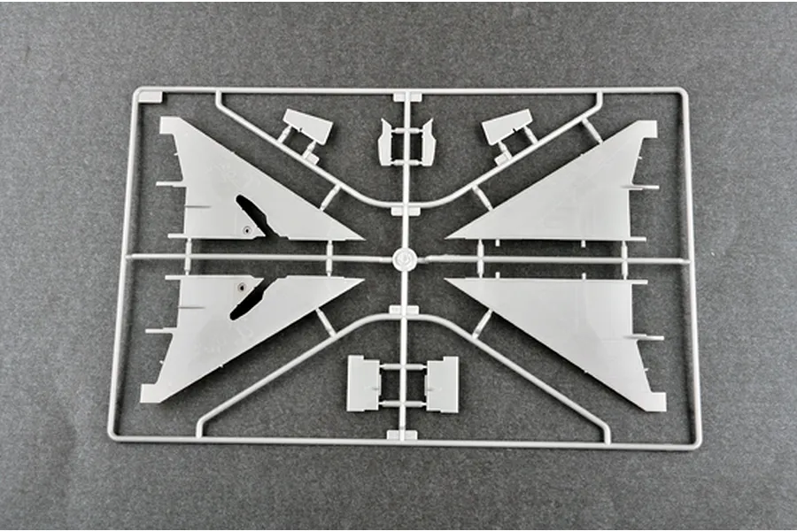 A grey plastic sprue from a Trumpeter 1/48 scale model kit containing aircraft wing and control surface parts.