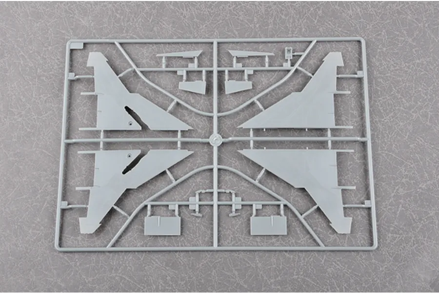 A grey plastic sprue containing aircraft wing components for a 1/48 scale model kit.