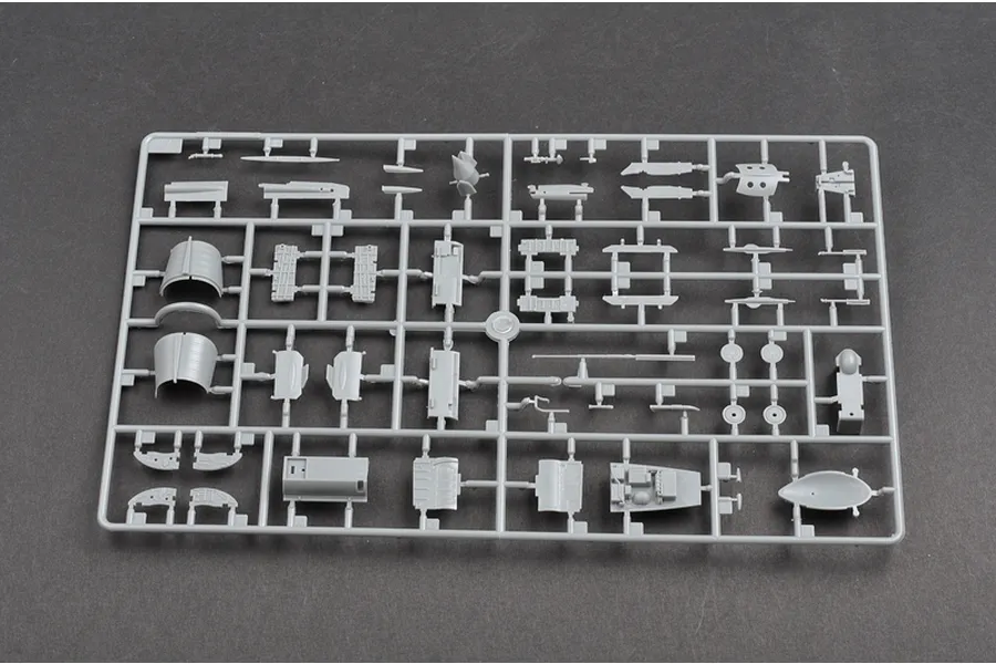 A grey plastic sprue containing various unpainted model aircraft parts for a 1/48 scale MiG-21F-13 model kit.