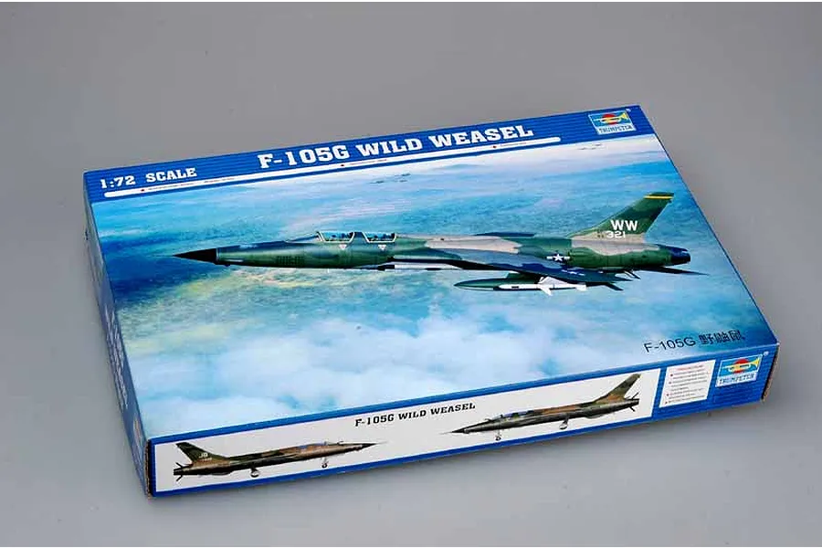 Trumpeter 1/72 scale F-105G Wild Weasel model kit box showing artwork of the aircraft in flight over clouds.