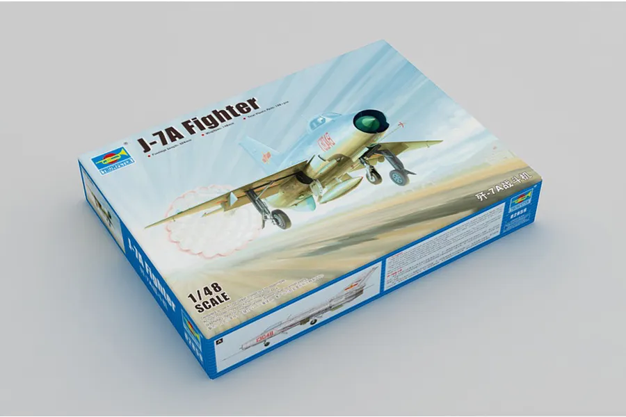 Trumpeter 1/48 scale J-7A Fighter plastic model kit box showing artwork of the aircraft in flight.