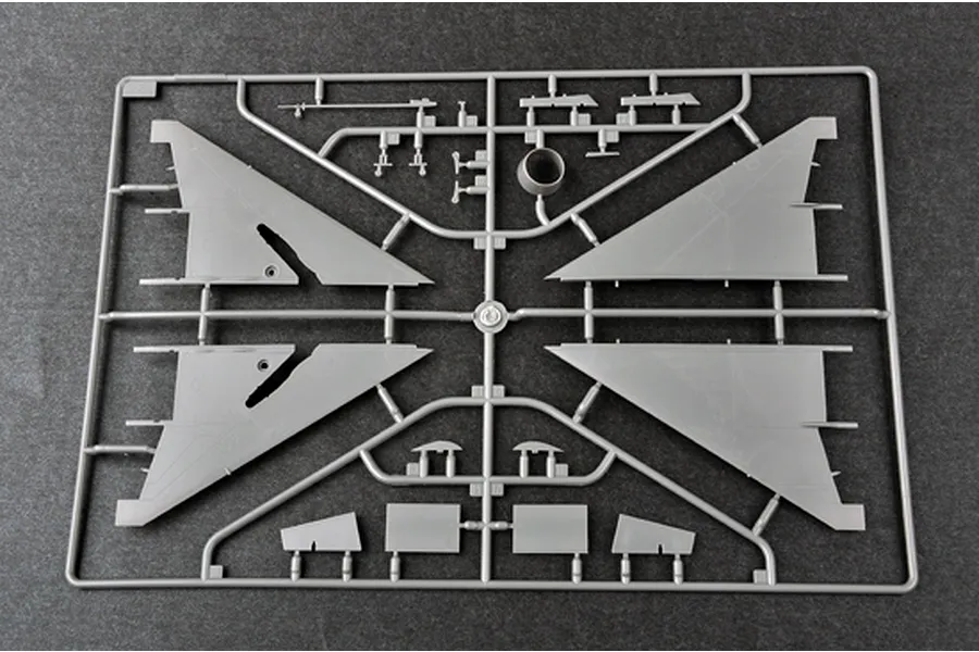 A grey plastic sprue containing model aircraft wing and control surface parts for a 1/48 scale model kit.