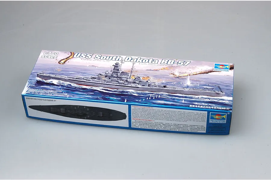 Trumpeter 1/700 scale USS South Dakota BB-57 battleship plastic model kit box showing artwork of the ship at sea.