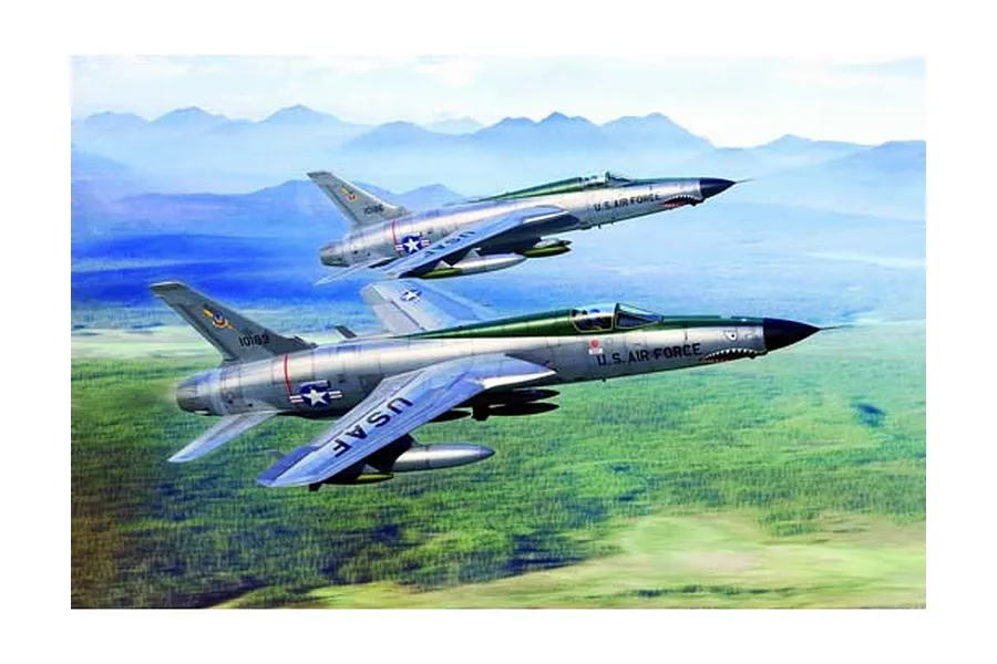 Box art illustration of two F-105 Thunderchief fighter jets flying in formation over a green landscape with mountains in the distance.