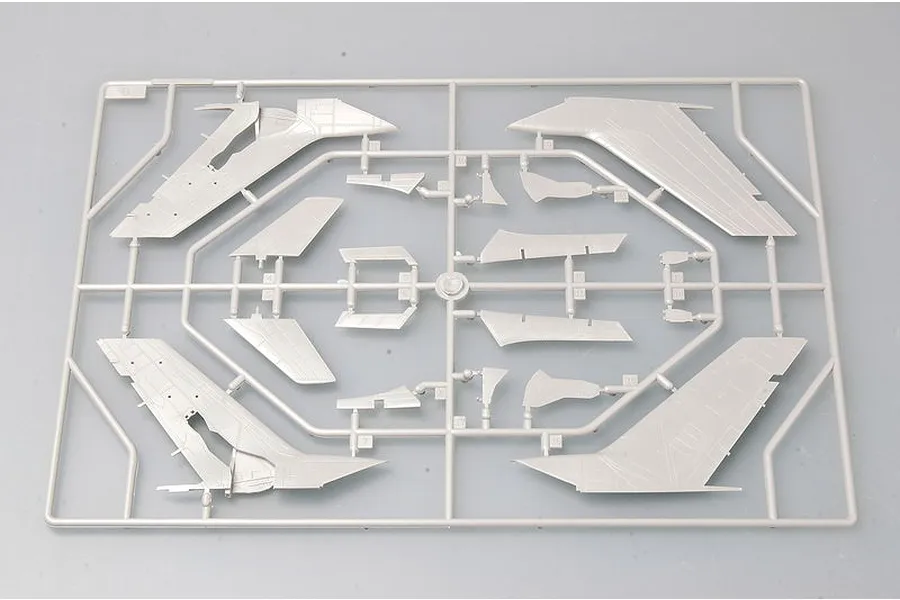 A grey plastic sprue containing various aircraft wing and tail components for a 1/72 scale model kit.