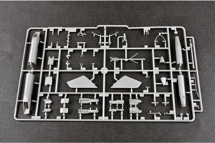 A grey plastic sprue containing various unpainted model aircraft parts for a MiG-29UB model kit.