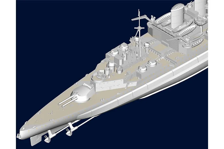 A high-angle view of a grey plastic model ship kit, showing the bow, deck details, and superstructure against a dark blue background.