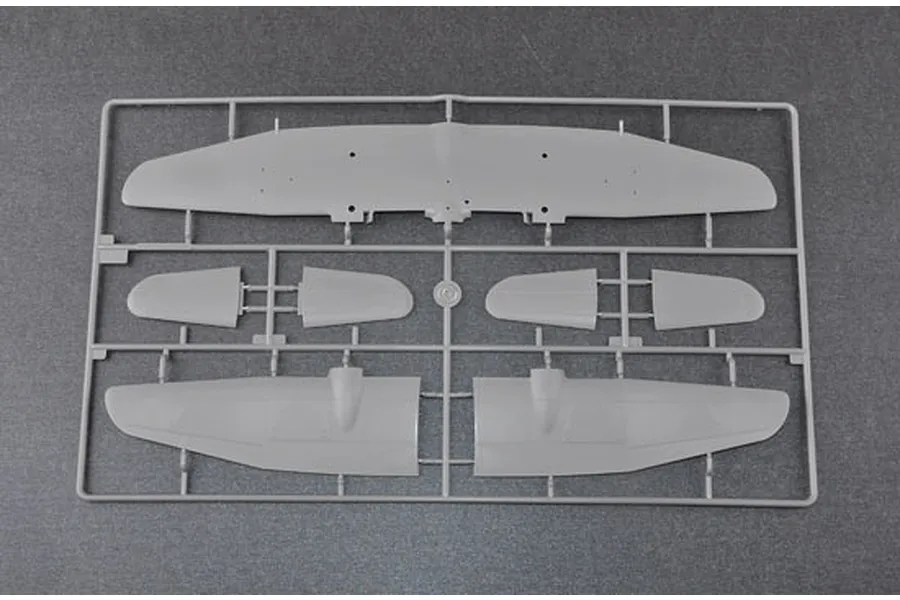 A grey plastic model aircraft sprue containing wing and tail sections for a 1/48 scale model kit.