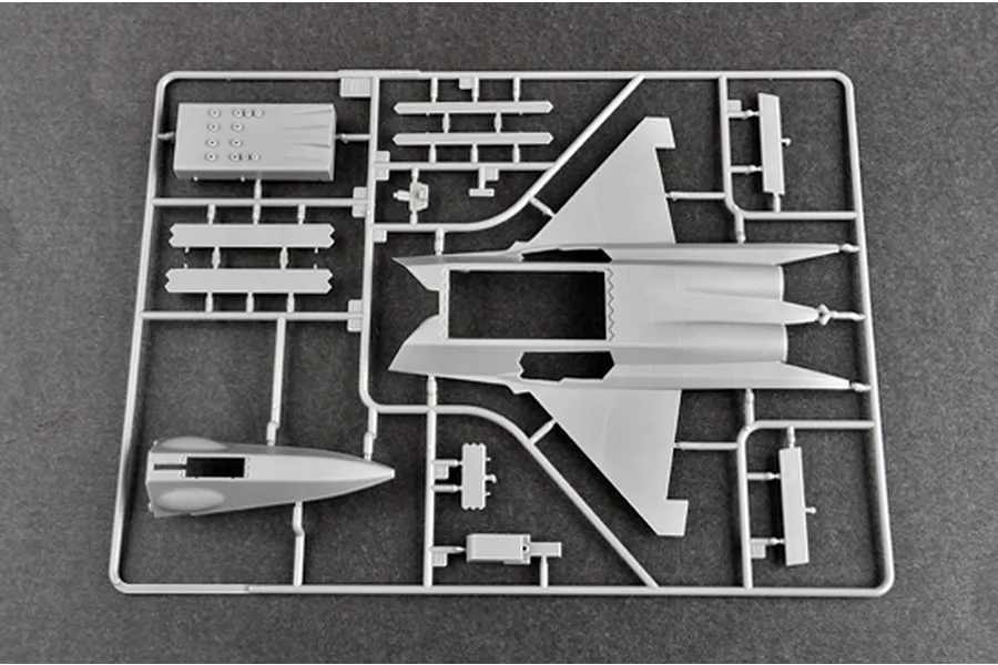 A grey plastic sprue containing parts for a 1/72 scale model aircraft kit, including the main fuselage and nose section.