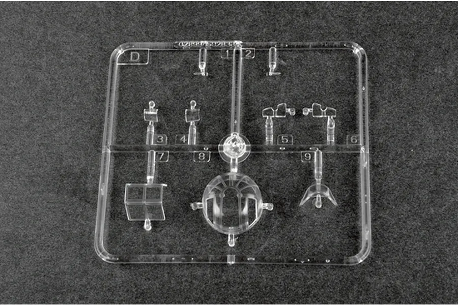 A clear plastic sprue labeled D containing various transparent canopy and cockpit parts for a 1/48 scale model aircraft kit.