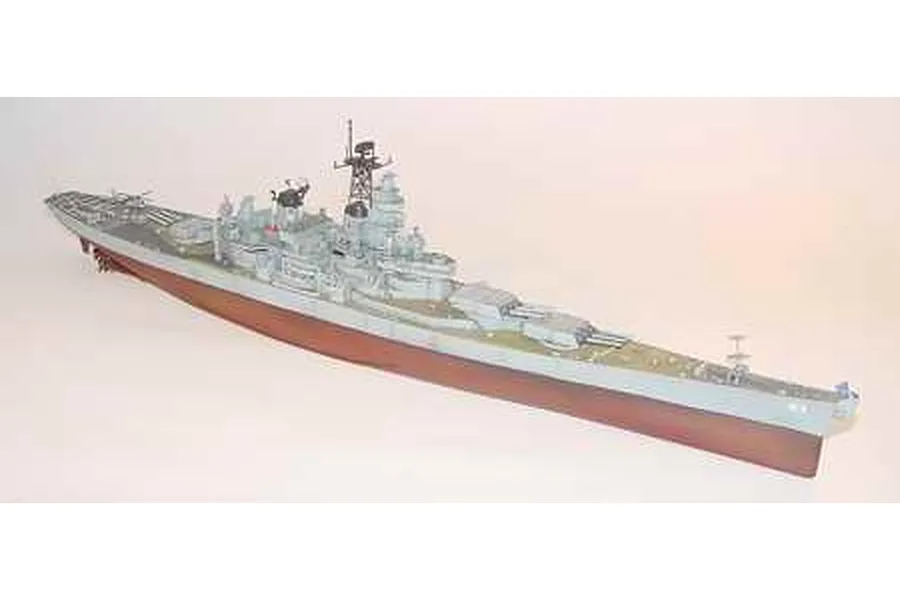 A 1/700 scale plastic model of the USS Missouri battleship, shown from a high-angle side view against a plain background.
