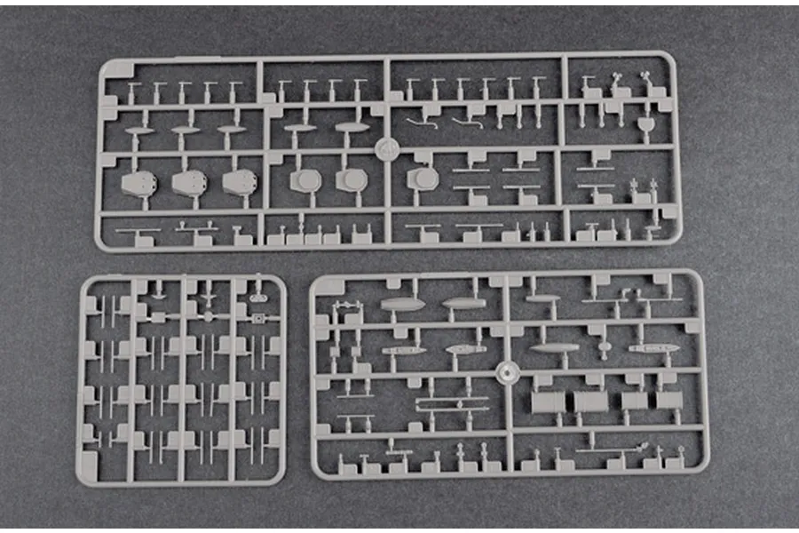 Three grey plastic model kit sprues containing various small parts for a 1/700 scale battleship model.