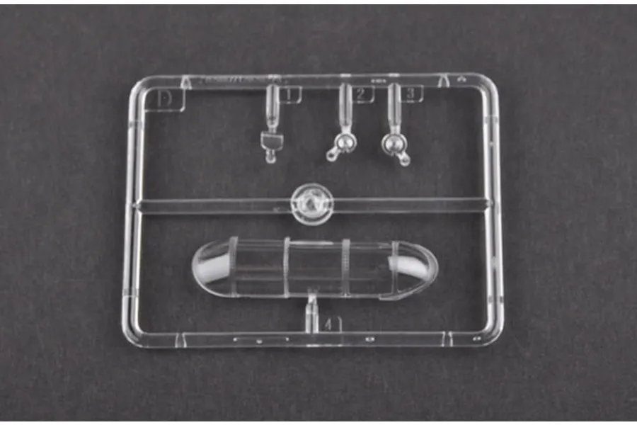 A clear plastic sprue containing a canopy and small cockpit parts for a 1/48 scale model aircraft kit.
