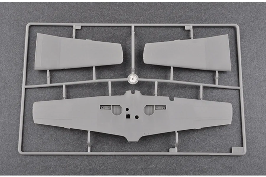 A grey plastic model kit sprue containing aircraft wing components for a 1/48 scale Nanchang CJ-6 model.