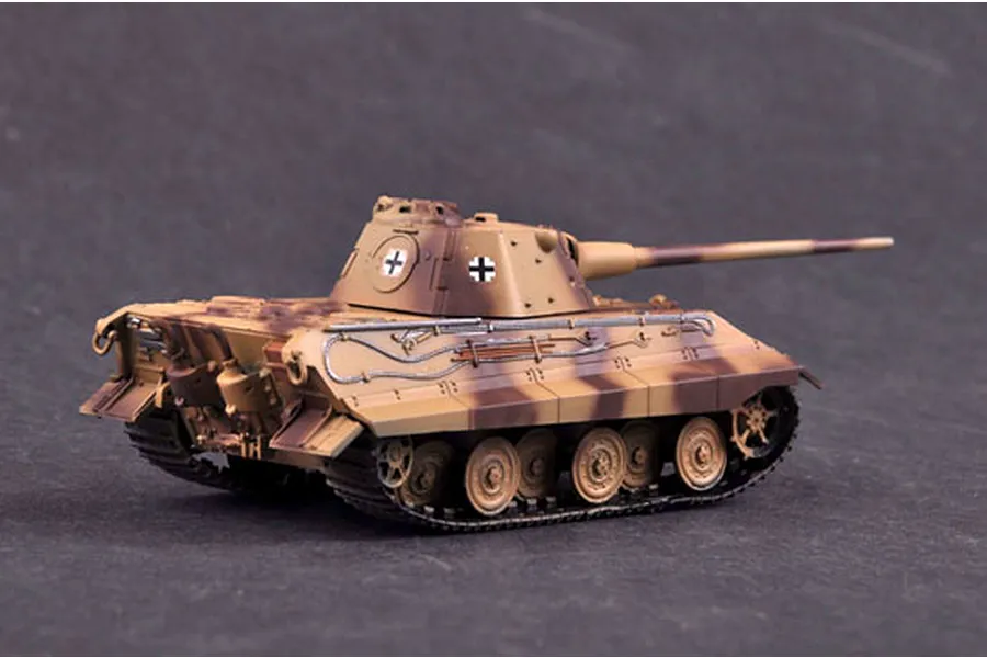 A 1/72 scale plastic model of a German E-50 tank with camouflage paint, viewed from the rear three-quarter angle on a dark grey background.