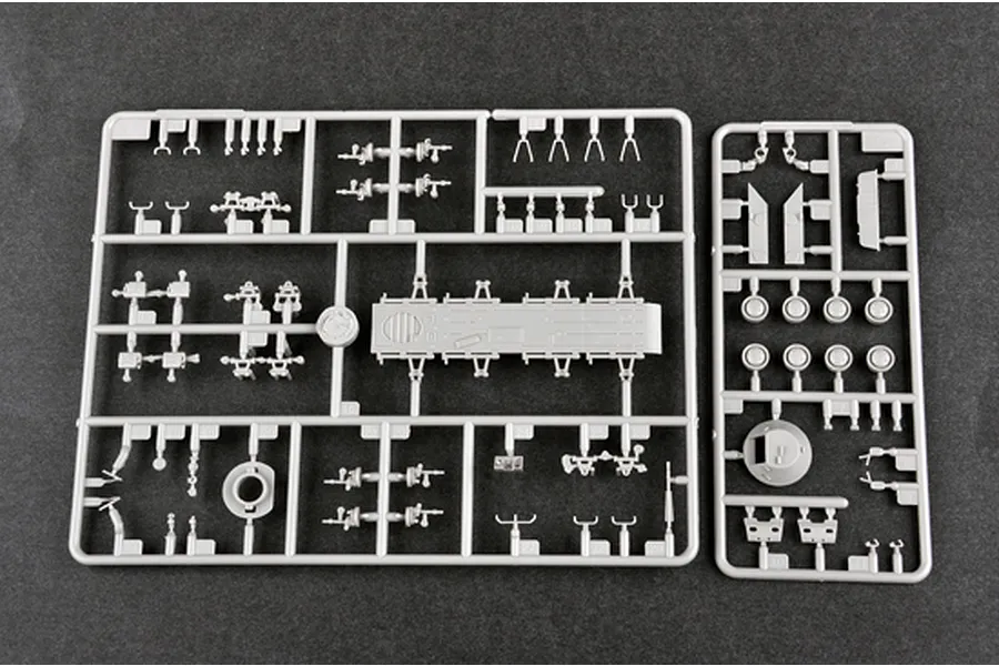 Two grey plastic model kit sprues containing various vehicle parts for a 1/72 scale BTR-70 APC model kit.