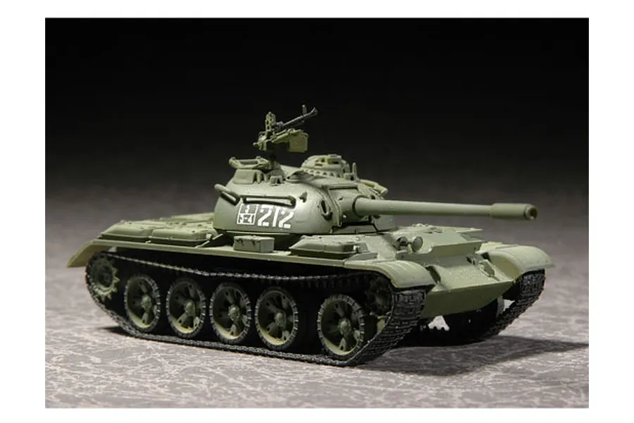 A 1/72 scale plastic model of a Russian T-54B medium tank, painted in olive green with the number 212 on the turret, displayed against a dark background.