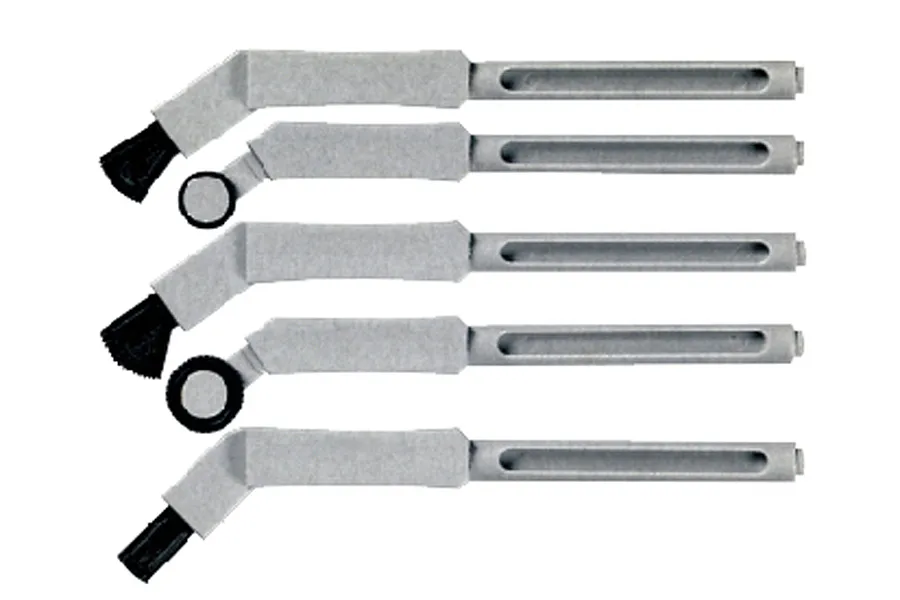 Five grey plastic modeling tools with various textured heads for applying Zimmerit coating, arranged vertically against a white background.