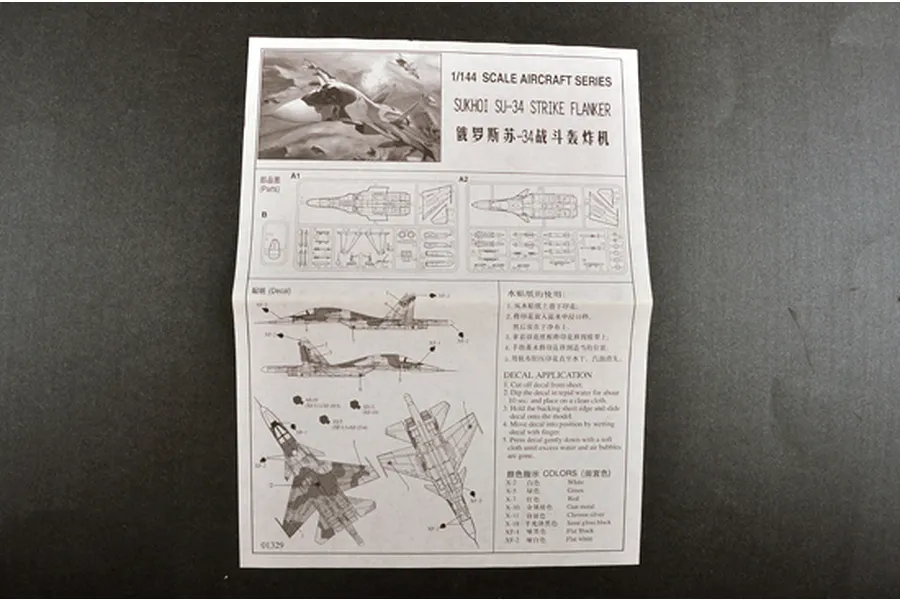 Instruction manual for Trumpeter 1/144 scale Sukhoi SU-34 Strike Flanker model kit, showing assembly diagrams and decal placement guide.
