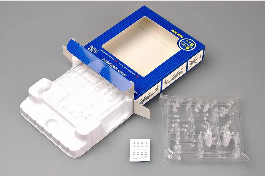 Trumpeter 1/350 scale SH-60B Sea Hawk helicopter model kit packaging, including a blue box, plastic parts trays, and a decal sheet.