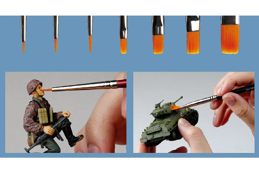 A set of seven Trumpeter modeling brushes with orange synthetic bristles, shown in use painting a miniature soldier and a scale model tank.