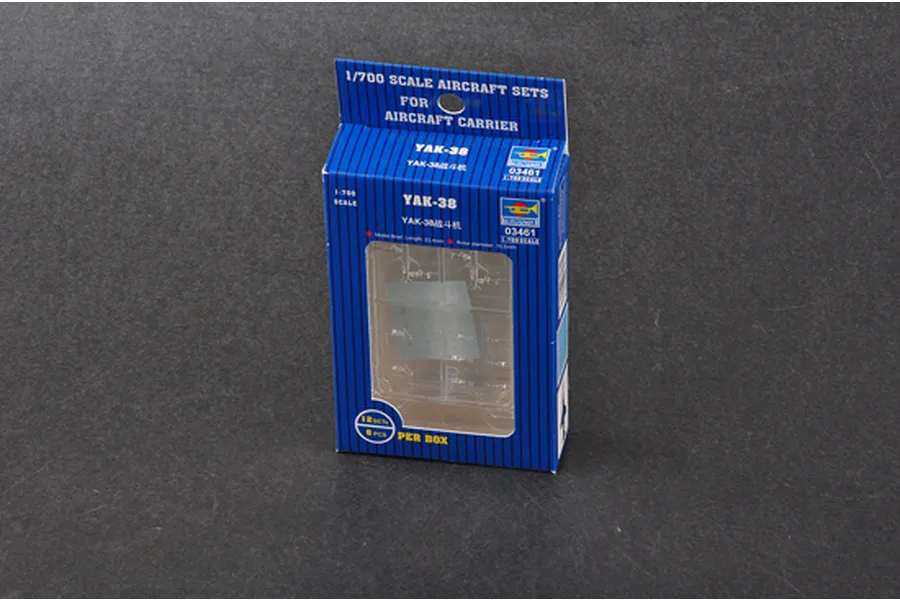 Trumpeter 1/700 scale YAK-38 aircraft model kit box containing 12 pieces, displayed on a dark grey surface.