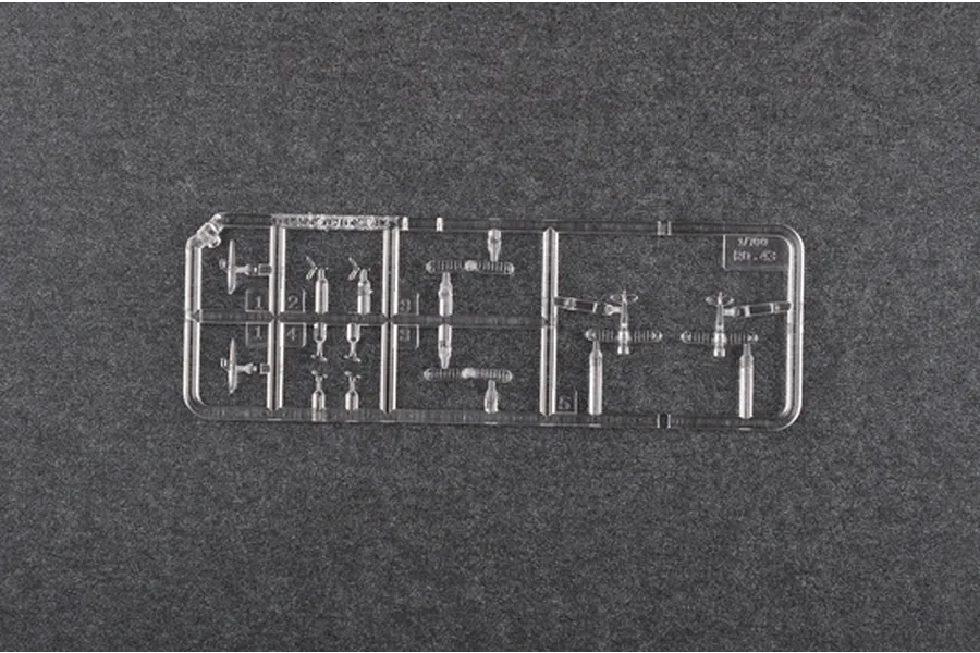 A clear plastic sprue containing miniature 1/700 scale IMAM Ro.43 aircraft parts on a dark grey background.