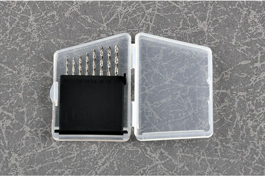 A set of eight Trumpeter craft drill bits ranging from 1.0mm to 1.7mm, stored in a black plastic holder inside a clear plastic case.