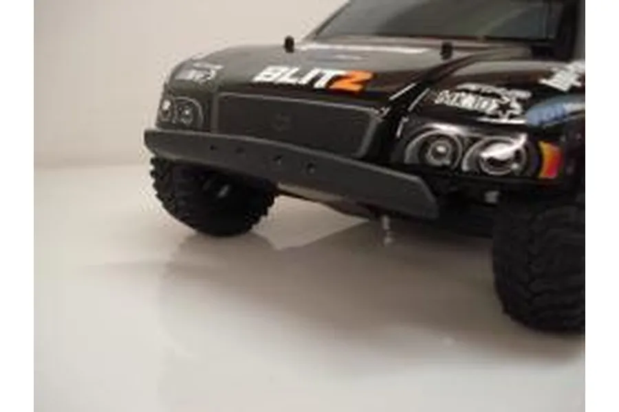 Close-up of a black T-Bone Racing front basher bumper installed on an HPI Blitz RC short course truck.