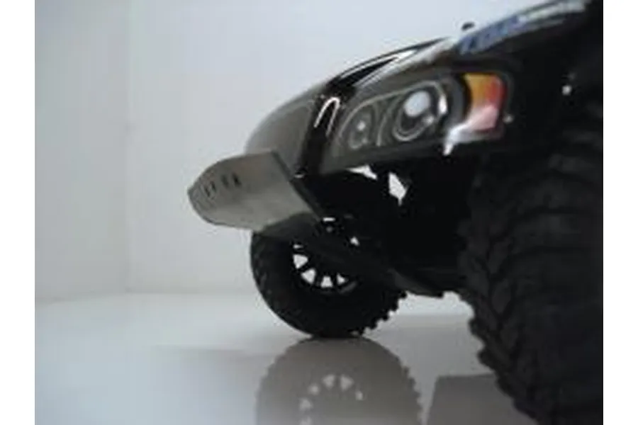 Close-up of a T-Bone Racing front basher bumper installed on an HPI Blitz RC truck, showing the black plastic bumper extending from the front chassis.