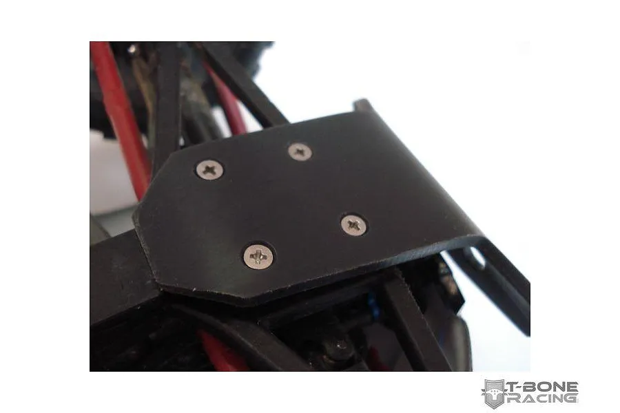 A black T-Bone Racing front bumper installed on a Traxxas 1/16 E-Revo RC vehicle, showing the mounting plate and screws.