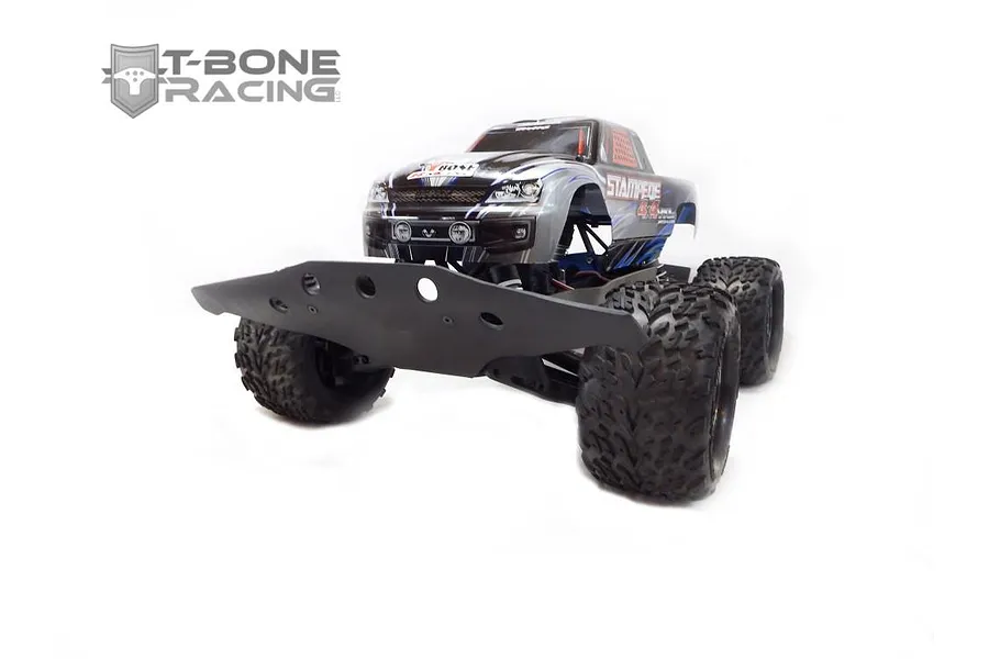 A T-Bone Racing wide front basher bumper installed on a Traxxas Stampede 4x4 RC truck against a white background.