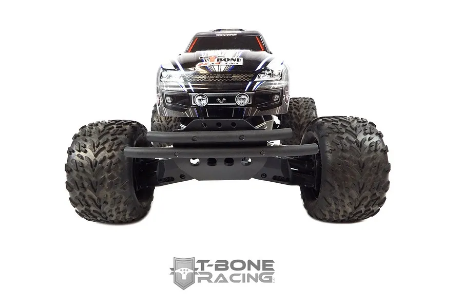 Front view of a Traxxas Stampede 4x4 RC truck equipped with a black T-Bone Racing XV4 front bumper, isolated on a white background.