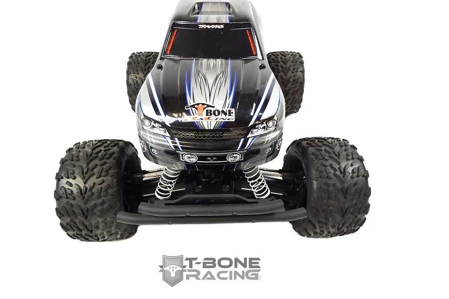 Front view of a Traxxas Stampede 4x4 RC truck equipped with a black T-Bone Racing front bumper, set against a white background.