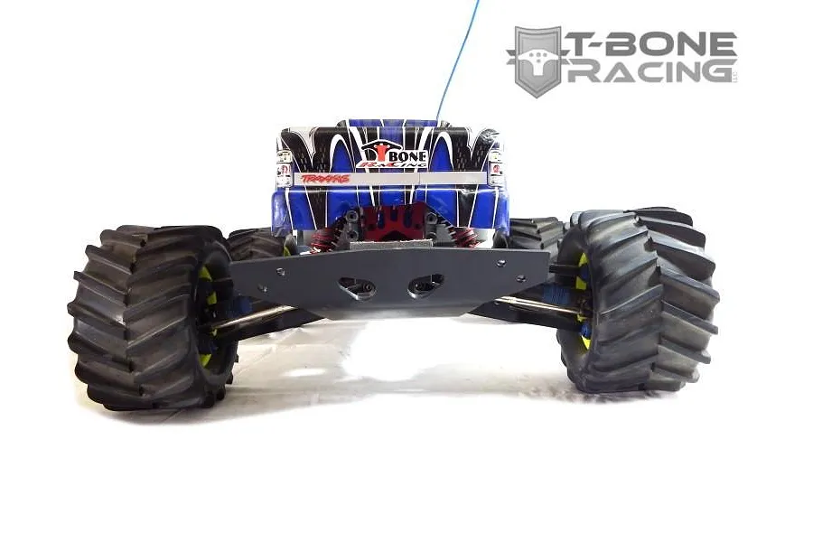 A rear view of a Traxxas E-Maxx RC monster truck featuring a T-Bone Racing wide black rear bumper installed.