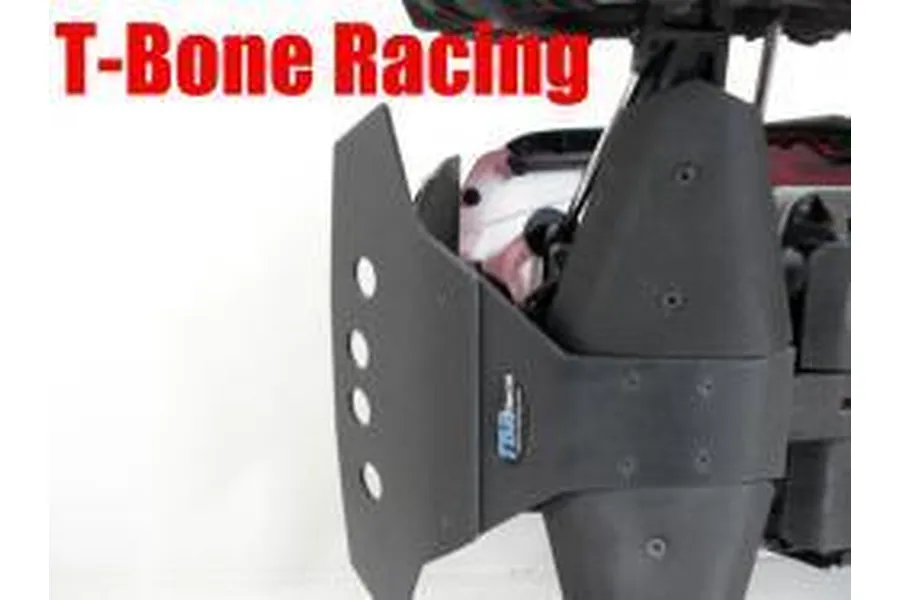 A T-Bone Racing black front bumper skid plate installed on a 1/10 scale RC vehicle.