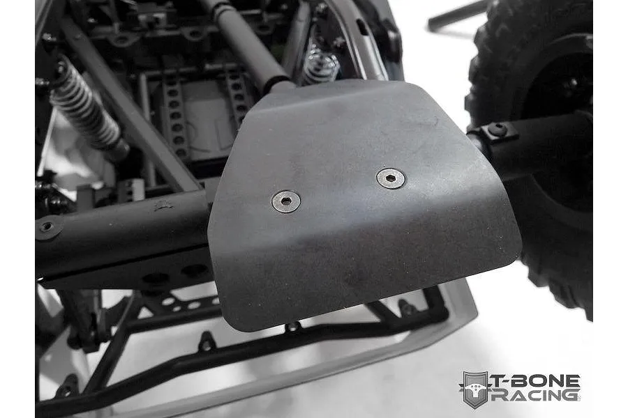 A T-Bone Racing black skid plate installed on the rear differential of an Axial Yeti Score RC vehicle.