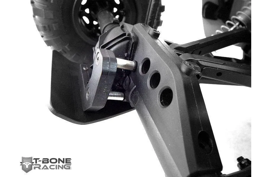 Close-up of a T-Bone Racing skid plate installed on the rear differential housing of an Axial Yeti Score RC truck.