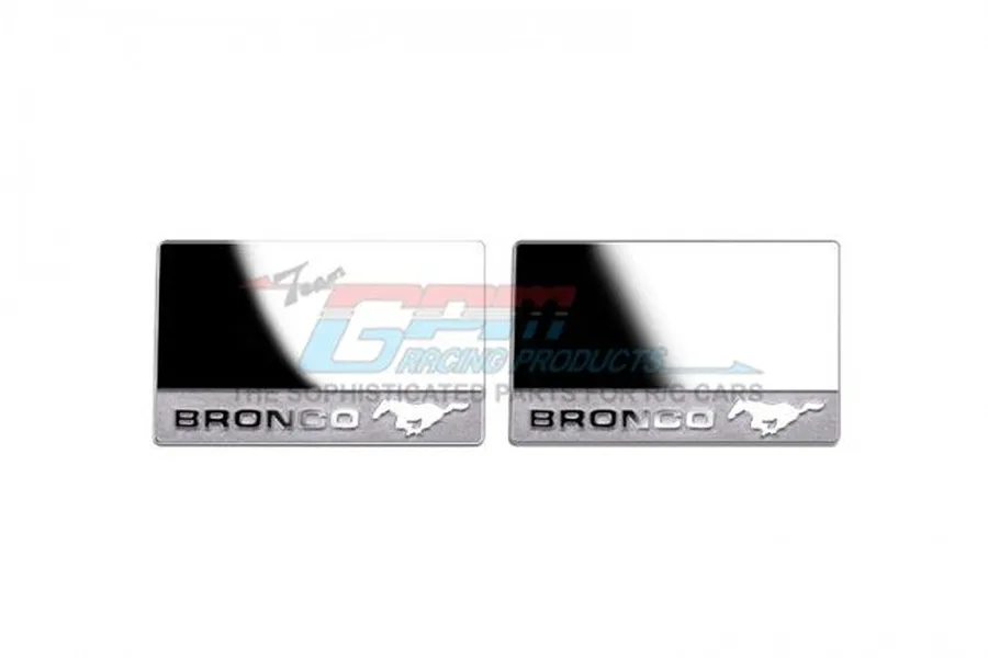 Two rectangular metal plates with Bronco branding and a horse logo, likely for RC car side mirrors.