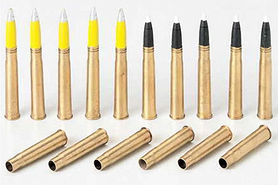 A set of 1/35 scale brass 88mm projectiles and shell casings for a Tamiya Tiger I model kit, arranged in rows on a white background.