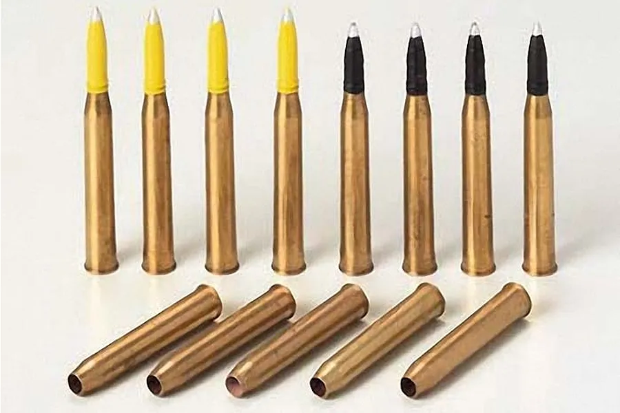 A set of 1/35 scale brass 88mm projectiles for Tamiya King Tiger model kits, featuring upright rounds with yellow and black tips and empty brass casings.