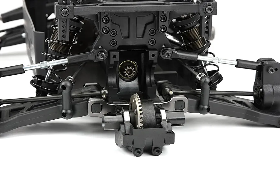 Close-up view of the rear suspension and differential assembly of a Pro-Line PRO-MT 1/10 scale RC monster truck roller.