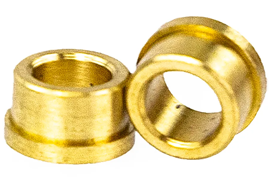 Two small brass-coloured flanged bushings for RC vehicles shown against a white background.