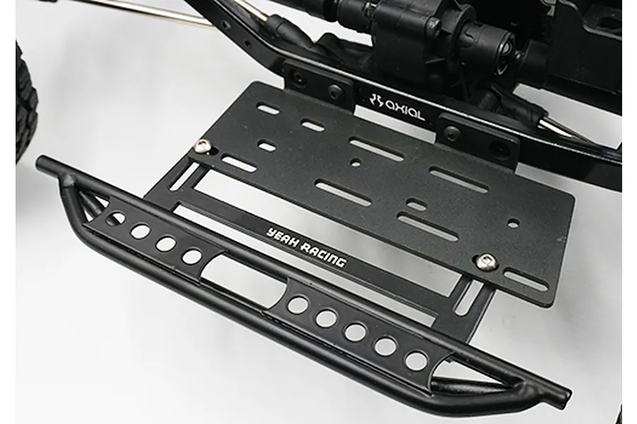 A black metal side step rock rail with a receiver box mount installed on an RC chassis, featuring the Yeah Racing logo.