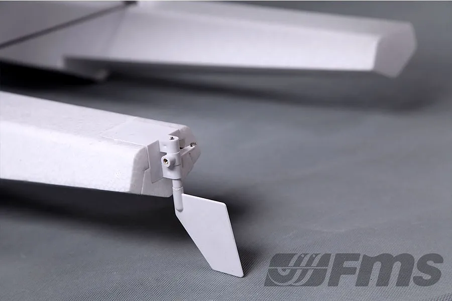 Close up of the white foam float and water rudder assembly on an FMS RC seaplane.