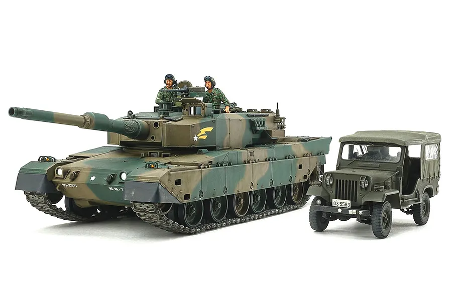 A 1/35 scale Tamiya model kit featuring a Japanese JGSDF Type 90 tank and a Type 73 light truck, both painted in camouflage.