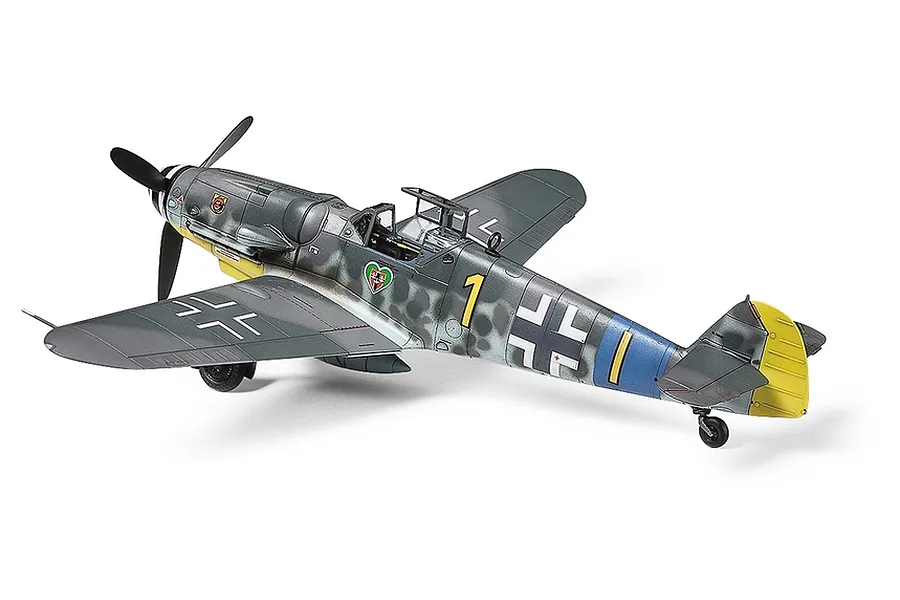A fully assembled and painted 1/72 scale Tamiya Messerschmitt Bf109 G-6 model aircraft on a white background.